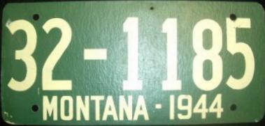 1944 Montana Remade License Plate over 1943 IL fiberboard License Plate