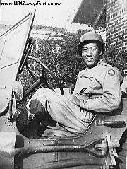 Pfc. Noel Okamoto, 442nd RCT, 232 Combat Engineer Company, driver of platoon leaders jeep.